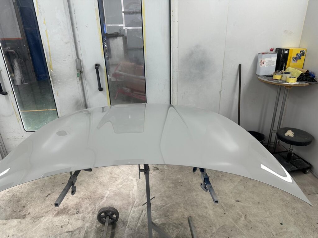 Professional Car Body Panel Respray at MRC Limited Bodywork respray in progress on a vehicle panel by MRC Limited team